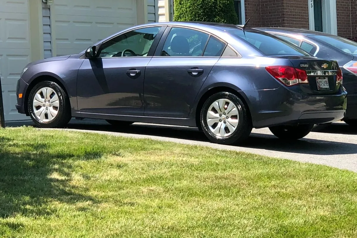 Detailed grey Chevrolet Cruze parked in a driveway